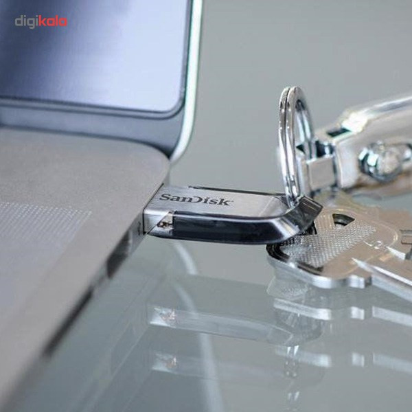 فلش مموری سن دیسک Ultra Flair CZ73 ظرفیت 64 گیگابایت با رابط USB 3.0 و بدنه فلزی مقاوم، سرعت انتقال 150 مگابایت بر ثانیه و سازگار با انواع سیستم‌عامل‌ها و دستگاه‌ها